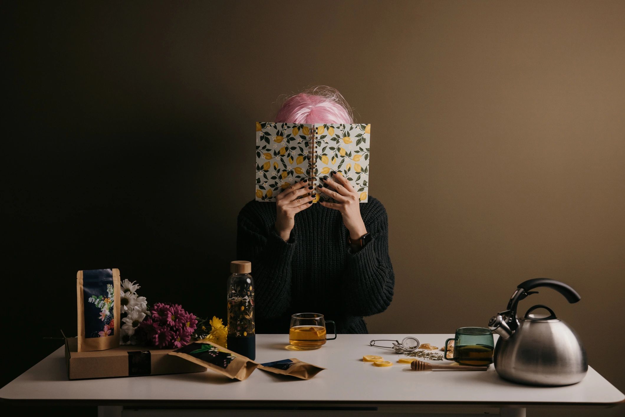 Lifestyle editorial scene with notebook and groceries