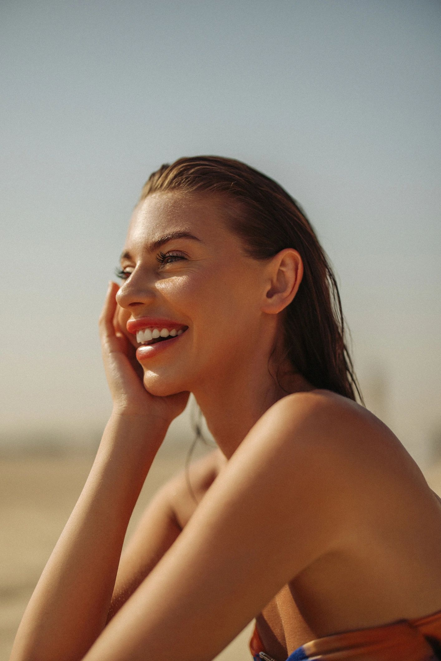 Portrait of a cheerful woman smiling in natural light